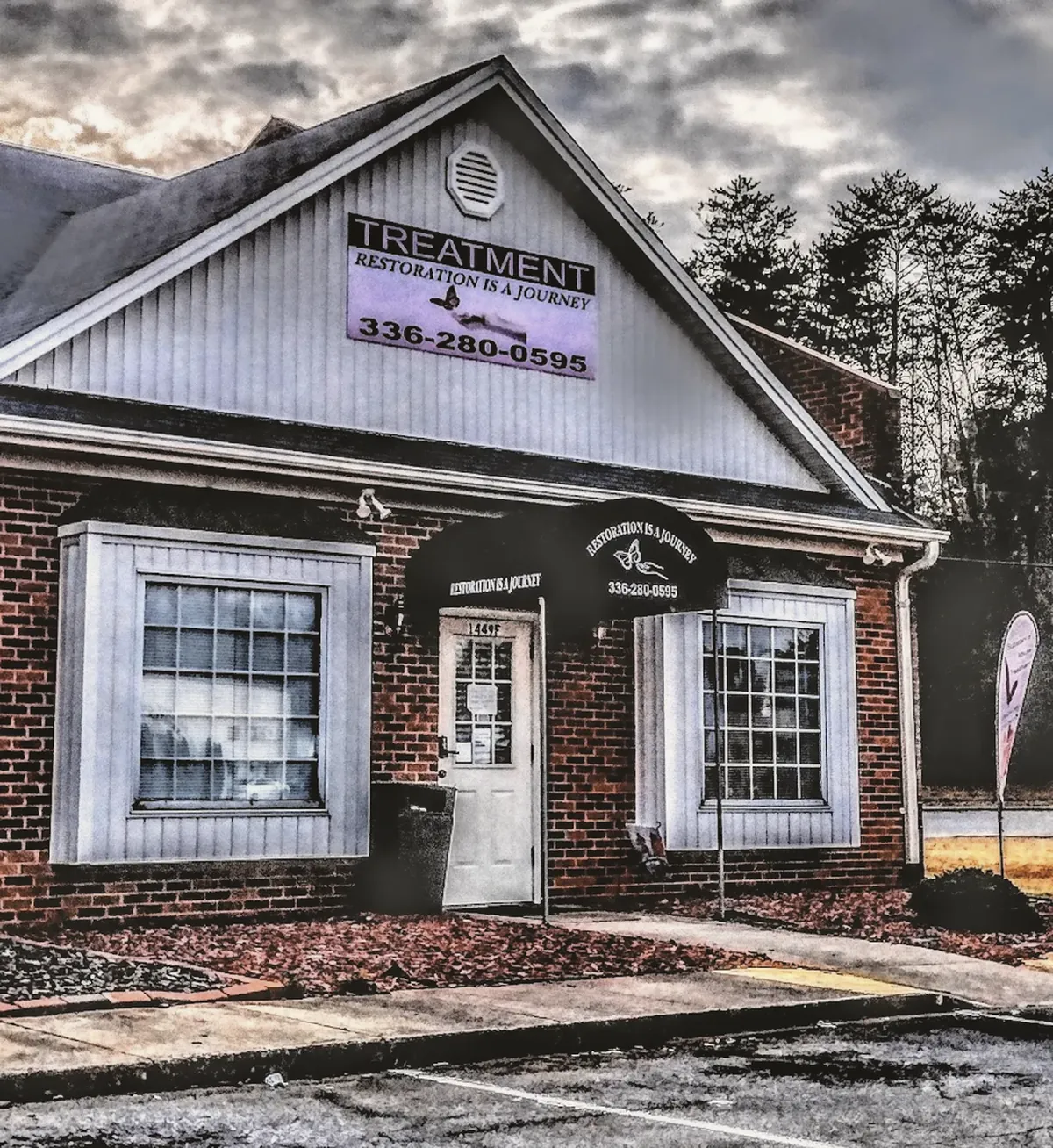 The Restoration is a Journey clinic in Reidsville, a brick building with a sign and awning